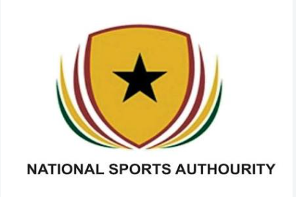 Sports administrators reviewing policy documents in Accra Ghana