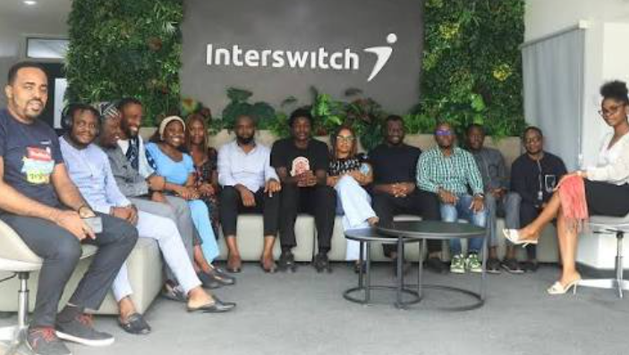 Software engineers reviewing payment gateway architecture at a technology hub in Abuja Nigeria