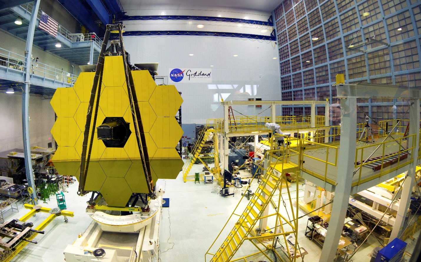Engineers inspect the primary mirror assembly at Goddard Space Flight Center.