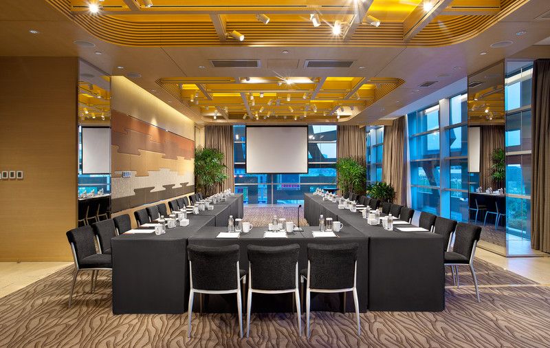 A conference room set up for high-level international political negotiations.