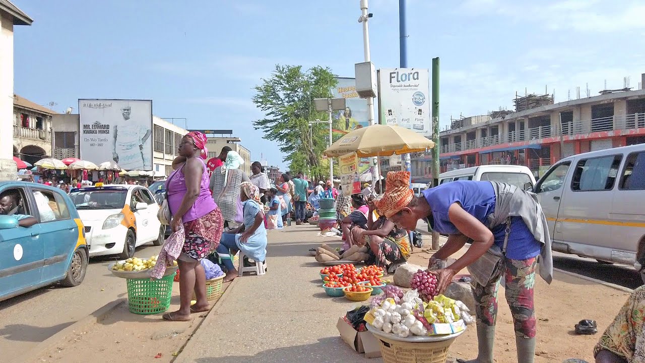 Busy street view of commercial districts in Accra during festive season preparations, Ghana.