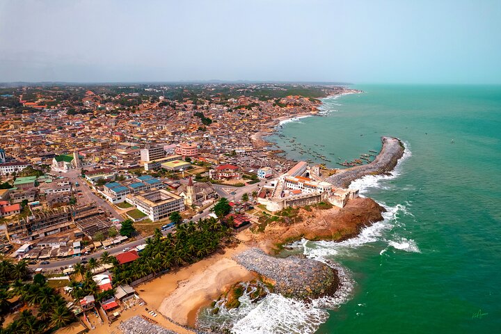 Historic masonry walls of a coastal fort exposed to marine erosion in Accra, Ghana.