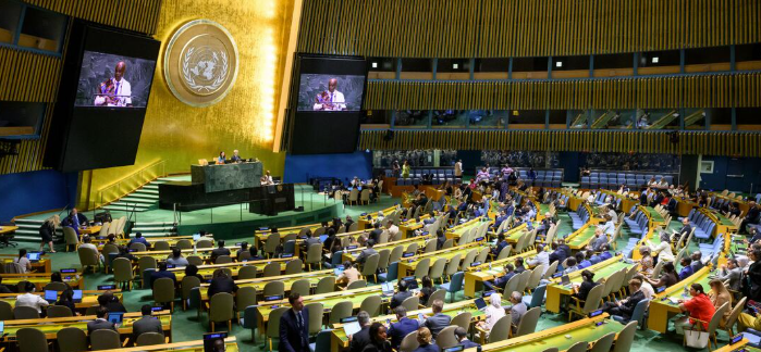 Delegates reviewing equal-area map projections at the United Nations headquarters in New York, United States.