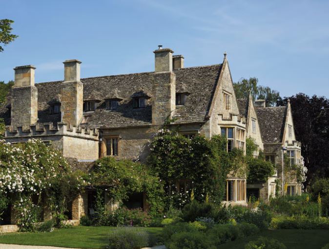 Exterior view of a historic British countryside estate residence.