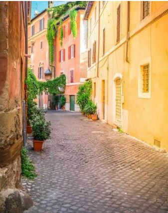 Historic architecture and cobblestone streets in Rome, Italy.