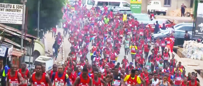 Participants running along the calibrated 42-kilometer route in Enugu, Nigeria.